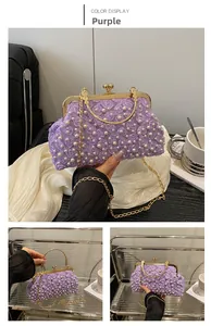 Detail view of purple vintage evening clutch with 3D floral lace and pearl embellishments