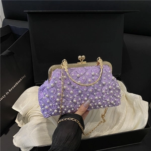 Elegant purple floral evening bag with pearl embellishments and gold chain strap