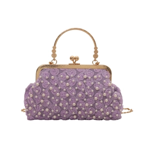 Elegant purple lace floral evening bag with faux pearl accents and gold metal ring handle