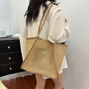 Large woven tote bag with brown leather trim shown in a stylish lifestyle setting