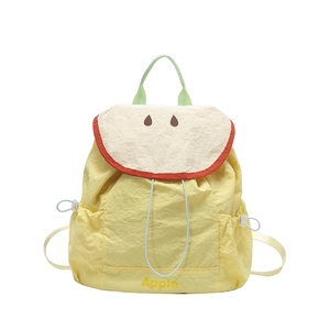 Sac à dos créatif jaune en forme de pomme en toile avec broderie et fermeture à cordon