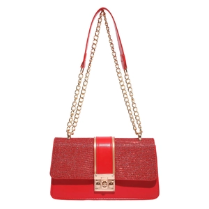 Chic red sequin patchwork crossbody bag with gold chain strap and metal lock