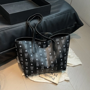Black pebbled tote bag with cartoon bear pattern and diamond print for commuting