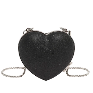 Mini black heart-shaped crossbody bag with glitter finish and silver chain strap
