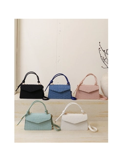Variety of colorful vintage square handbags with unique textured finish and knotted handles