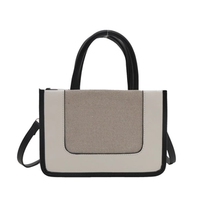 Contrast color large tote bag with top handles and shoulder strap in cream and gray