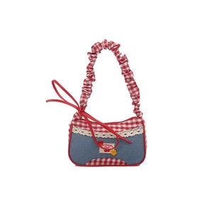 Pastel blue denim bowling bag with red gingham trim and sweet cherry patch detail