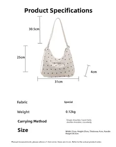 Tableau des tailles d'un sac hobo blanc à motifs, largeur 31cm avec nœud décoratif