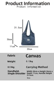 Detailed dimension guide for blue denim canvas tote bag with bow print and strap measurements