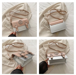 Detailed views of crossbody bag featuring pink flap, silver body and M logo metal charm