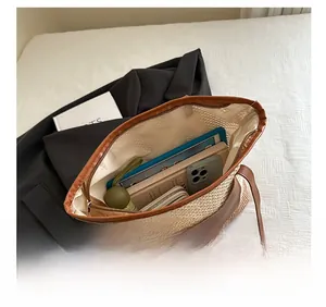 Top view of large straw tote bag with lace bow showing interior storage capacity