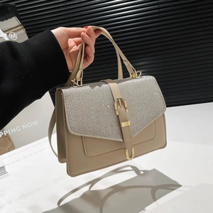 Chic beige crossbody bag with sparkling rhinestone flap and golden buckle detail