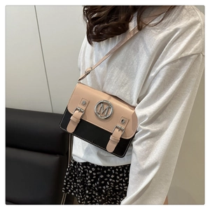 Detail of crossbody bag with silver M logo buckle and adjustable knit straps