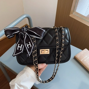 Quilted diamond chain bag with gold hardware and H-logo silk scarf detail handle