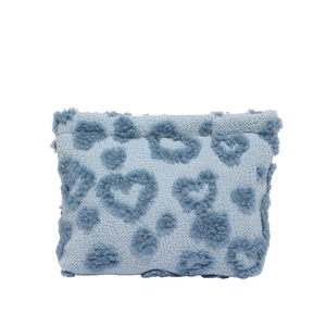 Soft light blue plush storage pouch featuring dark blue fuzzy heart patterns throughout