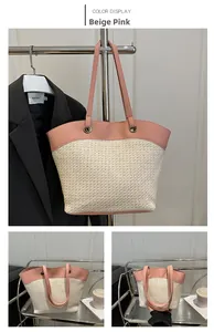 Detailed close-up of handmade woven tote bag with beige pink leather trim and long strap