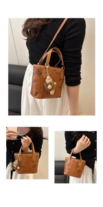 Brown vintage PU leather bucket bag with SMNL bear print and plush charm detail