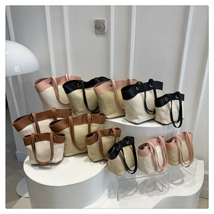 French vintage straw tote bags in various sizes with colorful leather trims and metal rings