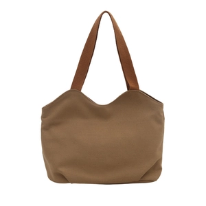Minimalist canvas tote bag in brown with scalloped edges and dark coffee handles