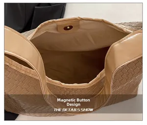 Macro view of magnetic buckle closure on a brown woven tote bag for secure storage