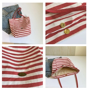 Detailansicht der gestreiften Canvas-Tasche mit Magnetverschluss und handgefertigtem Etikett