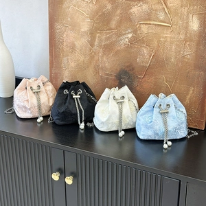 Mini drawstring bucket bag with butterfly embroidery and pearl chain straps in four colors