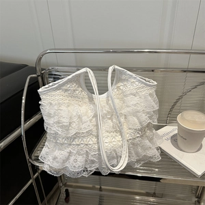 Elegant white lace tote bag with tiered ruffle design for summer beach vacations