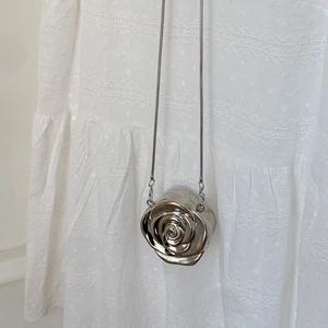 3D silver rose shaped chain handbag with metallic mirror finish for evening events