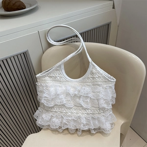 Elegant white lace ruffled tote bag with leather straps for summer beach vacations