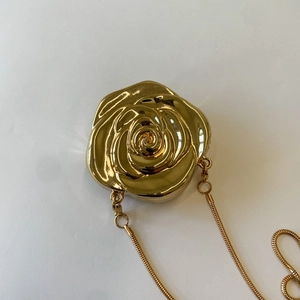 Exquisite golden 3D rose flower evening clutch bag with elegant metallic snake chain