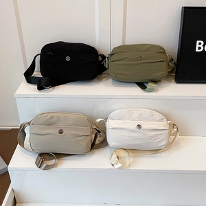Waterproof nylon multi-layer crossbody bags in four colors with adjustable straps