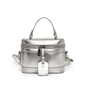 Silver metallic box bag with crackle finish and top handle for crossbody style