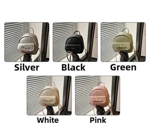 Close-up of five mini PU leather backpacks with bow details in silver, black, and pastel tones