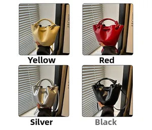 Mini bucket handbags with knotted handles in yellow, red, silver, and black leather