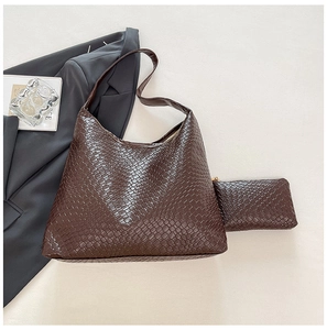 Deep brown woven leather hobo bag and matching pouch set in a professional flat lay
