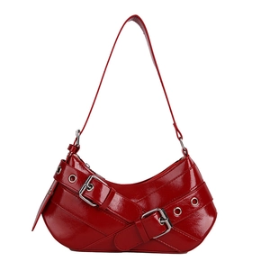 Retro red patent leather underarm bag with metal buckle straps and Y2K aesthetic style