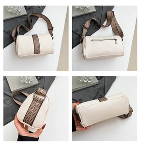 Multiple views of an off-white leather boston bag with retro V-pattern shoulder strap