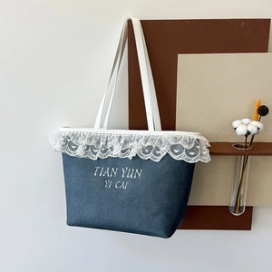 Navy canvas tote bag with white heart lace trim and elegant long top handles