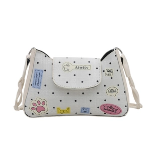 Retro large capacity white shoulder bag with black polka dots and cartoon patches