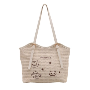 Beige straw woven tote bag with cartoon cat embroidery and long leather shoulder straps