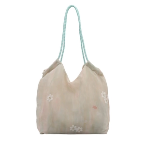 Large gradient tote bag with daisy embroidery and woven handles for summer travel