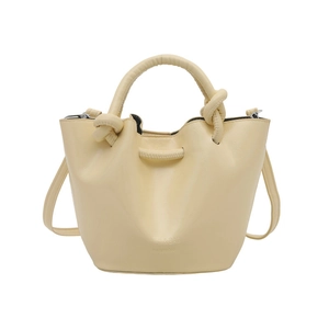 Sac seau beige pour femme avec poignées à nœuds et bandoulière réglable pour le style