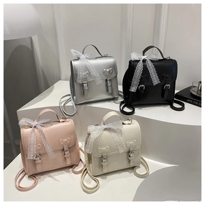 Mini PU leather backpacks with bow hardware and lace details in four soft colors
