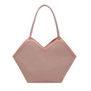 Pink woven tote bag with V-shaped opening and long shoulder handles in minimalist style