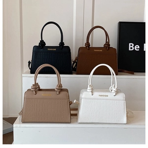 Minimalist square tote bag with knot handle and croc texture in four assorted colors