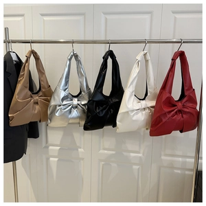 Chic faux leather tote bags with large bow design in five diverse fashion colors