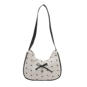 Chic quilted crescent hobo bag with black bow floral patterns and heart pendant