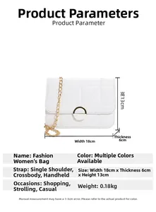 Detailed view of quilted stitching on white crossbody bag with gold ring clasp