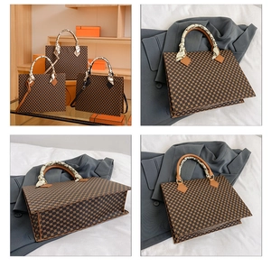 Detail view of retro plaid handbag featuring elegant silk scarf handles and gold hardware