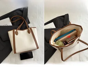 Detail view of the spacious vintage tote bag interior showing capacity for daily essentials